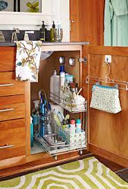 Many bathroom vanity cabinets only have storage underneath the sink. 19 Clever Ways To Organize Bathroom Cabinets Better Homes Gardens