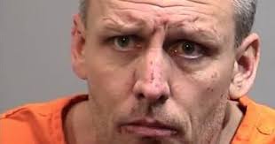 Two charged in murder