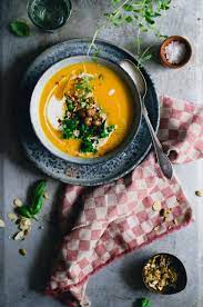 Sweet Potato Carrot Soup With Raz El Hanout Chickpeas Sauteed Kale Cashew Kitchen Sweet Potato Carrot Soup Carrot Soup Veggie Soup Recipes