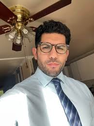 Should I grow out my hair like Sam's or keep a Dean-inspired haircut?