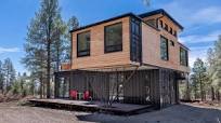 Experience LUXURY in this Super Modern Container Home in Mancos Woods!