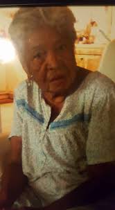 My Mom Gaudalupe Davila Charles, holding the phone. My aunt Carmen Charles,  her sister in law beside her.