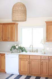 Ad How To Update A Dated 90 S Kitchen With Oak Cabinets Without Painting Them Deltafaucet Dayofdesign Delt Oak Kitchen Cabinets Oak Kitchen Kitchen Design
