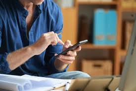 Download Casually Dressed Unrecognizable Man Using Smartphone At Work In Office For Free Mobile App Virtual Assistant Pocket App