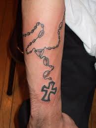 A skilled tattoo artist can render the design so that it has a realistic 3d effect, appearing as a string of beads that wraps around your skin. Black Rosary Armband Tattoo On Wrist Tattooimages Biz
