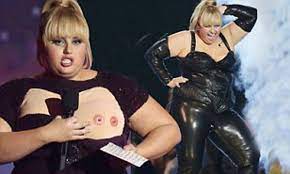 MTV Movie Awards 2013: Rebel Wilson pushes the boundaries as she shows off  ¿double nipple¿ onstage after showing off her curves in skintight leather |  Daily Mail Online