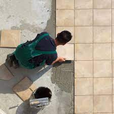 Depending on the type of flooring in your bathroom, you may need normally you'd pick a flexible adhesive if tiling onto plywood, or a strong, high bond adhesive for concrete floors. Laying Floor Tiles On Concrete Slab Concrete Tile Floor Ceramic Floor Tiles Porcelain Floor Tiles