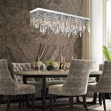 This fixture with simple clean lines is suited for dining rooms or family rooms. Rectangular Crystal Chandelier With Linear Design Dining Room Luxury Dining Room Decor Luxury Dining Room Contemporary Dining Room Lighting