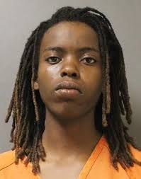 Woman charged with stabbing