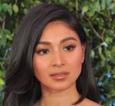 According to nadine, the rose on her wrist is an act of giving herself a flower every time she struggles in loving herself. Nadine Lustre Newsbreak