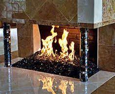 Indoor fireplaces fireplace wall wood burning slate family room photo galleries internet watch building. Indoor Fireplace Glass Rocks Bing Images Glass Fireplace Fire Glass Fireplace Fireplace Glass Rocks