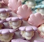 These clam shell macarons are a shore thing! 🐚 🪸 🤣, -, My most popular  summer design, year after year for the past 6 years 🥲, -, #OriginalDesign  #CustomMacarons #ClamShellMacarons #BeachMacarons ...