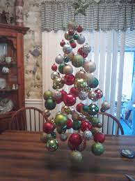 My Floating Christmas Tree That I Hung Each Ball From My Ceiling Fan With Fish Line And An Ornam Holiday Decor Christmas Hanging Christmas Tree Christmas Balls