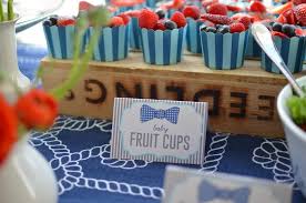 If the baby shower has a bows or bow ties theme, add both to your diaper cake to reflect the theme. Kara S Party Ideas Bow Tie Baby Shower Party Planning Ideas Decor Idea