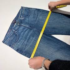 Be sure that the tape measure lays flat against the jeans to get an accurate measurement. Nydj Size Guide Jeans Trousers