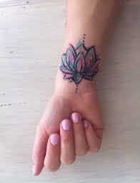 Many tattoo design ideas are beautiful and inspiring for girls like rose tattoos, flower tattoos, dragon tattoos wolf tattoos, simple henna tattoo, arm tattoos, wrist tattoos and forearm tattoos. Lotus Flower Watercolor Flower Wrist Tattoos Wrist Tattoos For Women Tattoos For Women