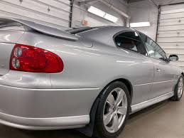 Image result for Dark Otter Gray 2004 Pontiac