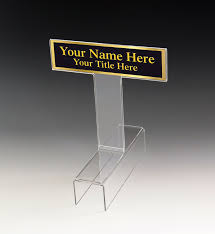 Enter desired information (name, title, etc.) in each nameplate. Raised Cubicle Name Plate Holder Partition Name Plate Acrylic Name Plate Holder Name Plate Plate Holder Desk Name Plates