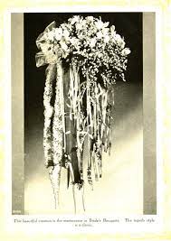 Gowns featured ornate beading and embroidery, while bouquets were larger than life. 17 Wedding Flower Arrangements Bouquets 1916 Click Americana