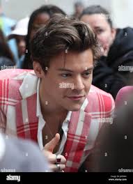 Nick grimshaw and harry styles hi-res stock photography and images