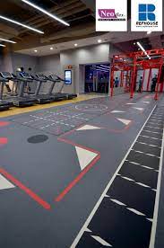 The company owned and operated its clubs around the world, until financial pressures saw parts of the company sold off to various owners in different regions between 2016 and 2017. Neoflex 600 Series With Graphics Fitness Flooring Fitness First The Curve Malaysia Workout Room Flooring Room Flooring Workout Rooms