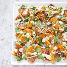 Here's a yummy way to bring out butternut squash's natural flavor. Roasted Butternut Squash With Yogurt And Sesame Seeds Cook S Illustrated