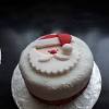 Go for gold decorations on the white cake. 1