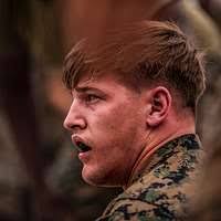 US Air Force SENIOR AIRMAN Angel Melendez, Material Control Supply  SPECIALIST, 603rd Air Control Squadron, Aviano Air Base, Italy, puts  together a camouflage spreader. The 603rd is deployed to Bovbjerg, Denmark,  in