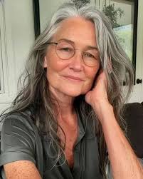 I'm 61. Love my curls, but considering letting some grey come in.  Constructive criticism only please.