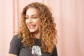 Great news is that layered hairstyles allow you to style your medium length hair into beautiful half updos. Long Curly Hair 45 Trending Styles All Things Hair Us