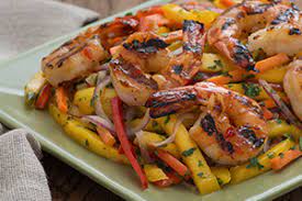 A perfect accompaniment to thai inspired barbecued chicken. Filippo Berio Thai Mango Salad With Grilled Shrimp