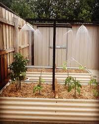 Vegie Garden Using Bunnings Pre Made Garden Beds We Installed Our Own Watering System Vegies Garden Garden Watering System Garden Boxes Outdoor Living