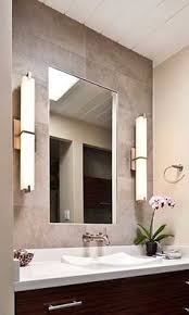 Wall lights are particularly useful in the bathroom, where they can provide necessary lighting around the vanity mirror. 40 Sconces On The Wall Ideas Wall Lights Wall Sconces Sconces