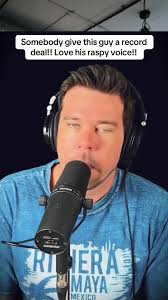 Guy Singer with Raspy Voice and Cross Earring