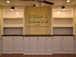 My Diy Built In Bookshelves Wall Is Finished Addicted 2 Decorating Bookshelves Built In Wall Bookshelves Living Room Plan