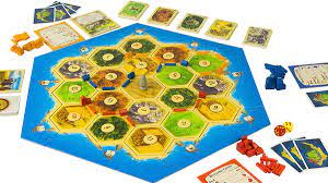 What i remeber is that it's a game somewhat similar to magic or munchkin. 10 Catan House Rules That Make The Classic Board Game Even More Fun Dicebreaker