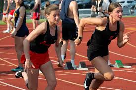 Reading and Jonesville compete in the Big 8 championship meet