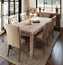 Six dining chairs are crafted from solid wood, and the long trestle table is made of solid and engineered wood. Simple Farmhouse Dining Table Table Designwalls Com