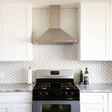 Small Scale White Hexagon Tiles With Black Grout Stand Out And Make The Backsplas Hexagon Tile Backsplash Kitchen Hexagon Tile Kitchen Kitchen Tiles Backsplash