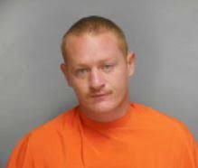 Police: Man points gun, demands money in gas station parking lot