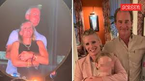 Astronomer CEO Andy Byron resigns, Kristin Cabot seen wearing wedding ring,  with apparent husband before the Coldplay kiss cam scandal | Music News -  The Indian Express