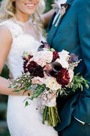 Perfect for an outdoor fall wedding, this bouquet features an assortment of wildflowers, roses, lilies, wallflowers, and hypericum berries in pretty autumn colors. 40 Burgundy Wedding Bouquets For Fall Winter Wedding Page 6 Hi Miss Puff