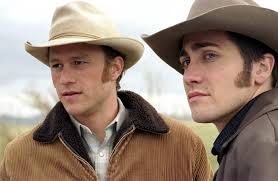 In this photo, two cowboys embrace. Brokeback Mountain Looks At Forbidden Love Lust The Towerlight