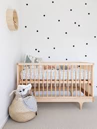 Black And White Baby Nursery Decor Black And White Polkadot Wall With A Natural Wood Crib Baby Room Inspiration Baby Room Design Kid Room Decor