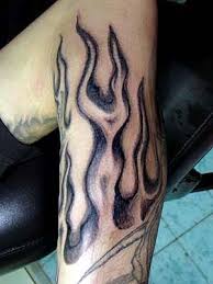 This type of design wraps around the arm, but only along a very narrow area. Prawan Blog Tribal Flame Tattoos