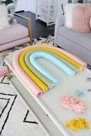 Wall decorations ideas at pinterest wallpapers. Oversized Rainbow Wall Hanging Diy A Beautiful Mess Rainbow Wall Hanging Diy Wall Hanging Diy Rainbow Room