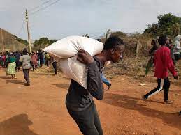 As part of giving back to the. Breaking News Mobs Loot 73 Trailers Load Of Covid 19 Food In Jos Mk Reporters