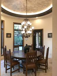 How Perfect Does This Round Dining Table Chairs Look In This Rounded Room Spanish Style Furniture Spanish Dining Room Round Dining Room