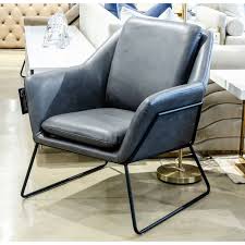 Its roomy design, plush cushions and pillows ensure comfort while you sit, and its unique color is sure to catch the eye of all who visit your home. Modrest Jennifer Industrial Dark Grey Eco Leather Accent Chair Overstock 31260439