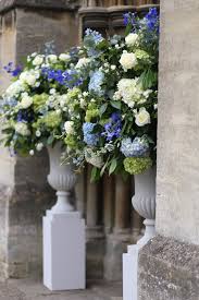 These large designs will always draw attention and no church will dwarf them. A Romantic Country Wedding Miriam Faith Floral Design London Wedding And Events Floristry